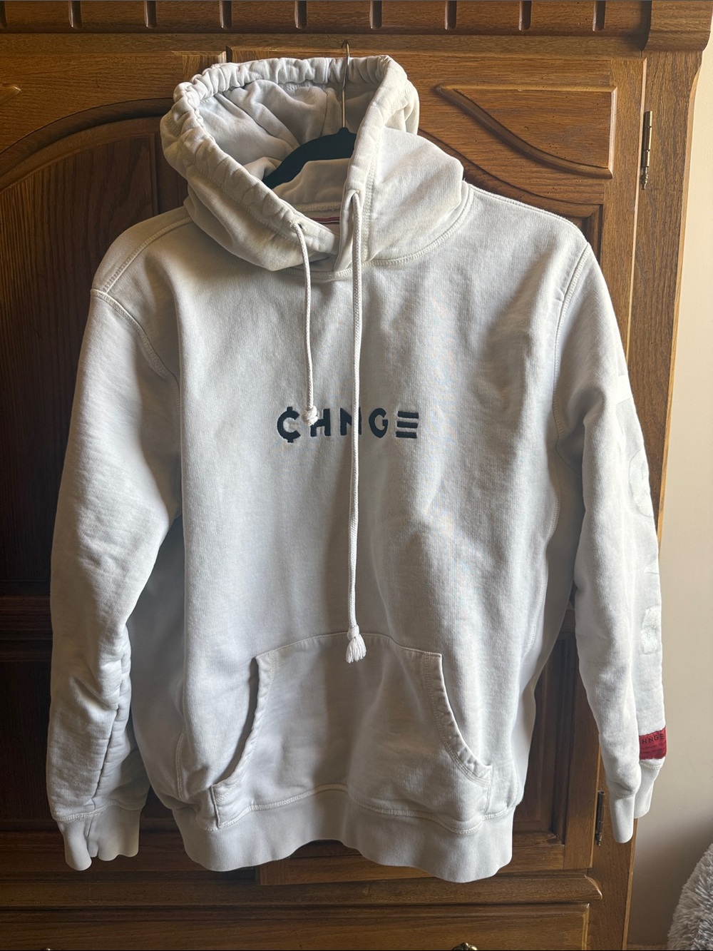 CHNGE White Hoodie with Red Trim Label